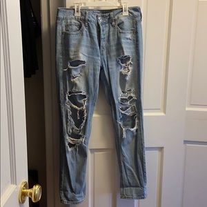 Light washed destroyed denim jeans